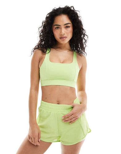 Padma - Reggiseno sportivo lime con imbottitura rimovibile - Born Living Yoga - Modalova