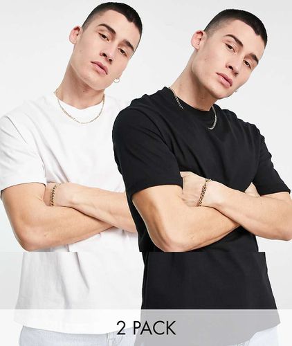 Confezione da 2 paia di T-shirt taglio lungo in nero e bianco - Bershka - Modalova