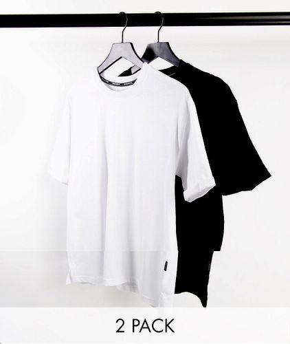 Confezione da due T-shirt taglio lungo nero e bianco - Bershka - Modalova