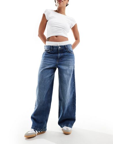 Jeans a fondo ampio con elastico in vita stile boxer lavaggio scuro - Bershka - Modalova