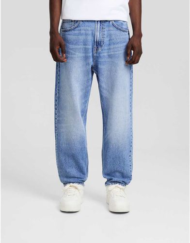 Jeans ampi medio slavato - Bershka - Modalova