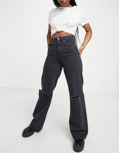 Jeans anni '90 con fondo ampio e strappi sulle ginocchia in cotone - BLACK - Bershka - Modalova
