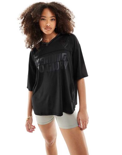 Maglia da calcio oversize con scollo a V nera - Bershka - Modalova