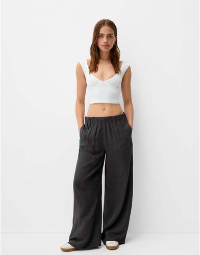 Pantaloni a fondo ampio scuro - Bershka - Modalova