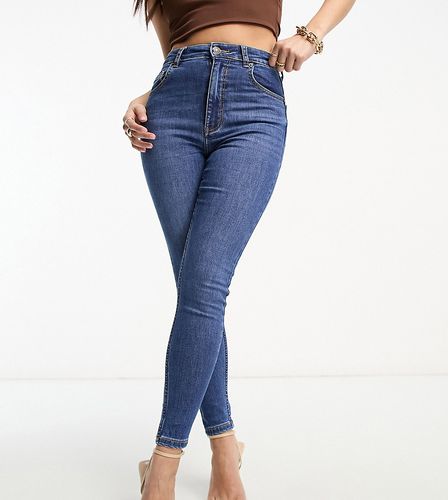 Petite - Jeans skinny a vita alta alla caviglia medio - Bershka - Modalova