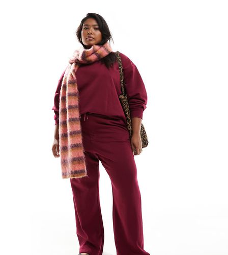 Esclusiva x Holly Wynne - Joggers a fondo ampio bordeaux con logo 555 in coordinato - Renee Studio - Modalova