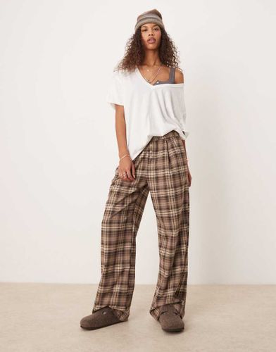 Nina - T-shirt oversize à col V - Ivoire - Free People - Modalova