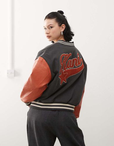 Giacca stile college nera con logo e stella sul retro - Karl Kani - Modalova