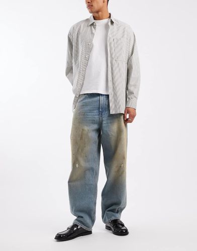 Jean baggy style skate effet taches de graisse - moyen délavé - Hollister - Modalova