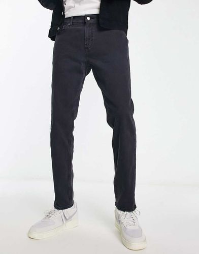 Jeans slim anni '90 con strappi sulle ginocchia nero slavato - Hollister - Modalova