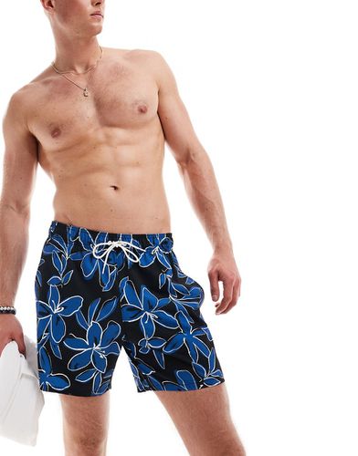 Pantaloncini da bagno da 9" neri con tasche laterali e stampa floreale blu - Hollister - Modalova