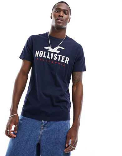 T-shirt tecnica con logo - Hollister - Modalova