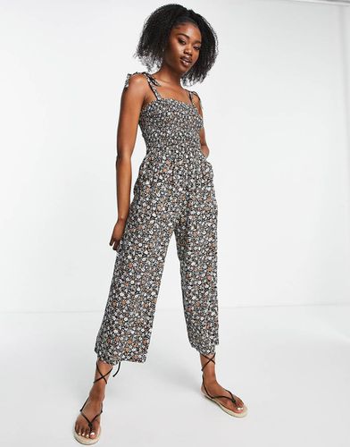 Tuta jumpsuit con laccetti sulle spalle nera a fiori - Hollister - Modalova