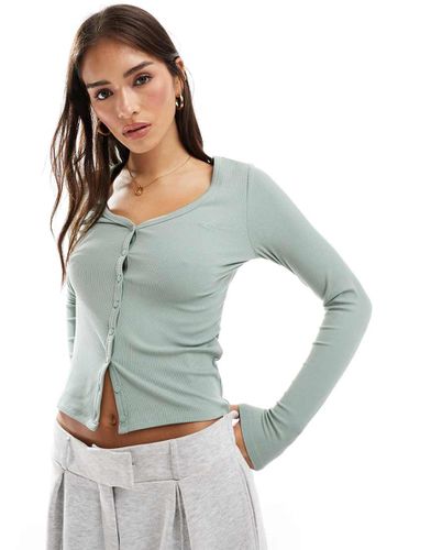 Top a maniche lunghe con bottoni - Hollister - Modalova