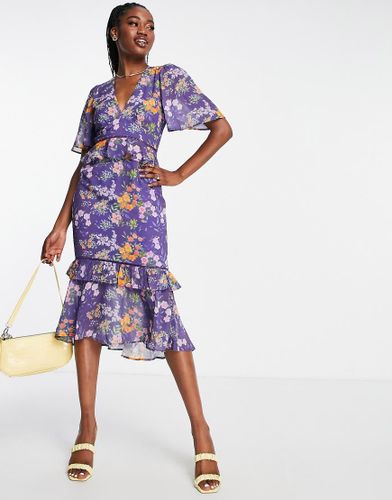 Robe mi-longue à imprimé fleuri avec dos ouvert et ourlet plongeant - Hope & Ivy - Modalova