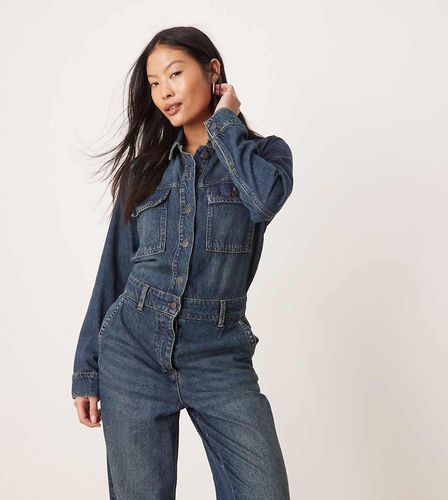 Tuta jumpsuit a maniche lunghe in denim lavaggio medio - JDY Petite - Modalova