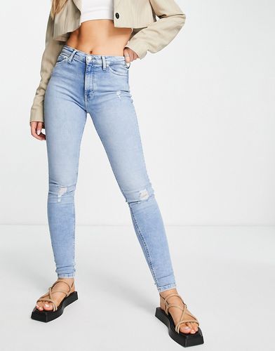 Jeans skinny a vita alta con dettagli effetto invecchiato sulle ginocchia lavaggio chiaro - ONLY - Modalova