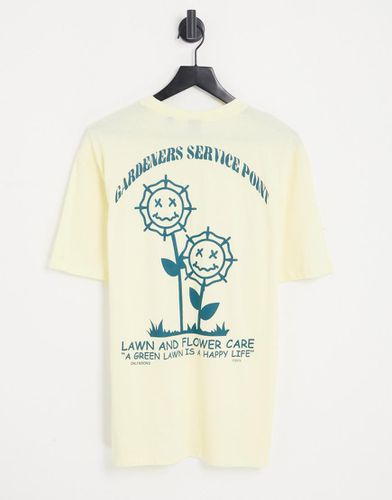 T-shirt oversize pastello con stampa sul retro di fiore sorridente - ONLY & SONS - Modalova