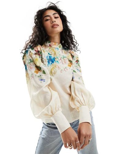 Blusa con maniche voluminose e stampa floreale - Other Stories - Modalova