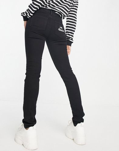 Jeans skinny neri con tasca con logo - Love Moschino - Modalova