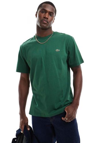 Lacoste - T-shirt con logo verde - Lacoste - Modalova