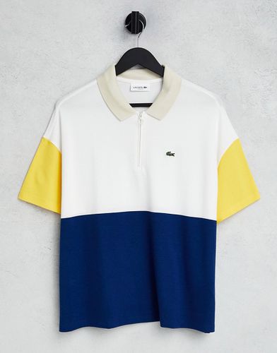 Polo blu navy e gialla color block con logo - Lacoste - Modalova