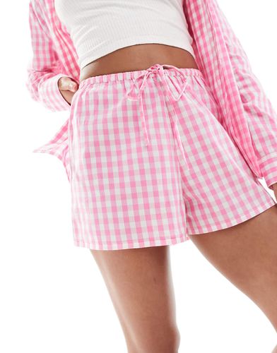 Pantaloncini del pigiama oversize rosa a quadretti in coordinato - Luna - Modalova