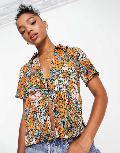 Camicia plissé a fiori arcobaleno con bottoni sul davanti - Monki - Modalova