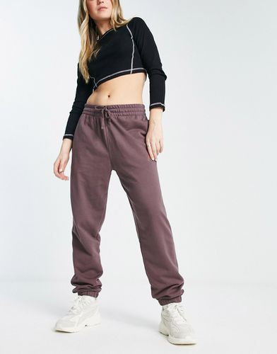 Joggers unisex color malva - New Balance - Modalova