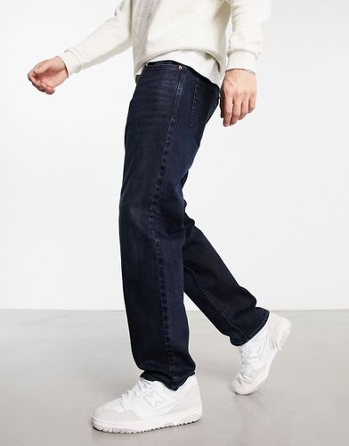Jeans dritti larghi lavaggio indaco scuro - New Look - Modalova