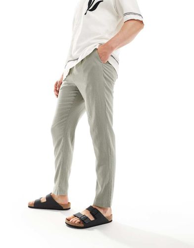 Pantaloni in misto lino color kaki - New Look - Modalova