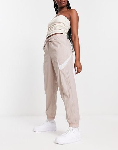 Essential - Joggers parachute color talpa - Nike - Modalova