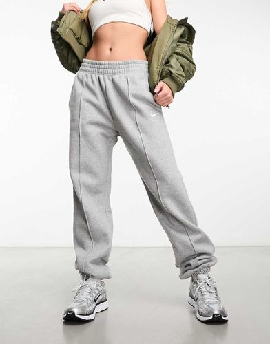 Joggers oversize grigi con logo piccolo - Nike - Modalova