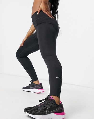 Nike - One Training - Leggings neri a vita medio alta in tessuto Dri-FIT - Nike Training - Modalova