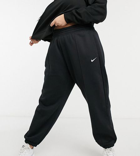 Plus - Joggers oversize neri con logo piccolo - Nike - Modalova