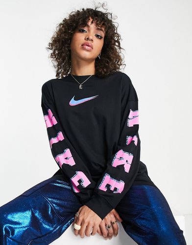 Sportswear - Maglietta a maniche lunghe con stampa grafica, colore - Nike - Modalova