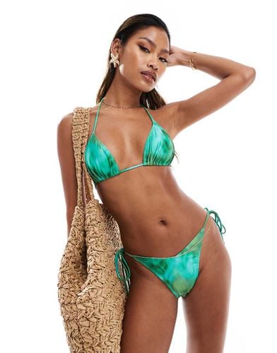 Slip bikini lucido con stampa astratta e lacci sui lati - South Beach - Modalova