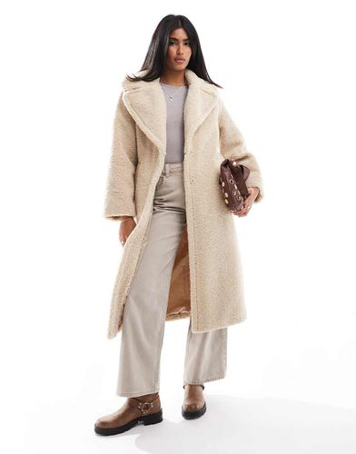 Cappotto taglio lungo in pile borg beige - Stradivarius - Modalova