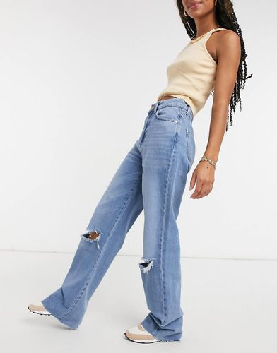 Jeans dritti anni 90 con strappi - Stradivarius - Modalova