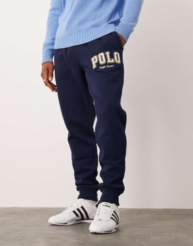 Pantalon de jogging polaire avec ourlets resserrés et logo style universitaire - croisière - Polo Ralph Lauren - Modalova