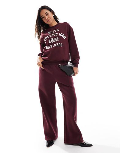 Joggers a fondo ampio bordeaux con grafica "San Diego" in coordinato - Pull & Bear - Modalova