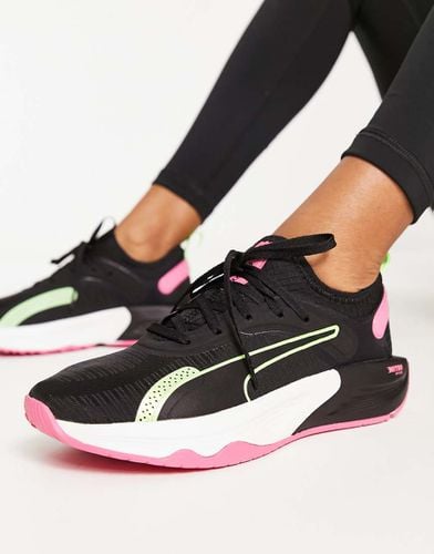 Training PWR XX Nitro - Sneakers nere, rosa e verdi - Puma - Modalova