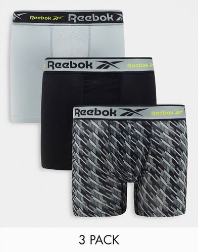 Braxton - Confezione da 3 boxer aderenti tecnici taglio medio neri e grigi con stampa - Reebok - Modalova