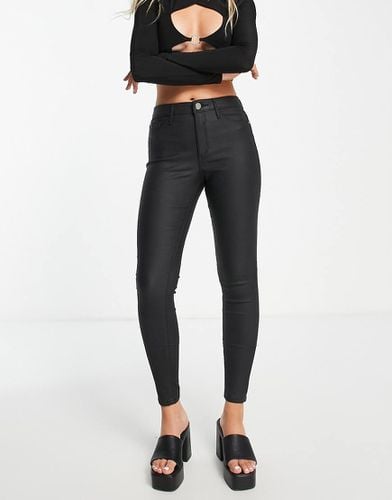 Molly - Jeans skinny spalmati a vita medio alta neri - River Island - Modalova