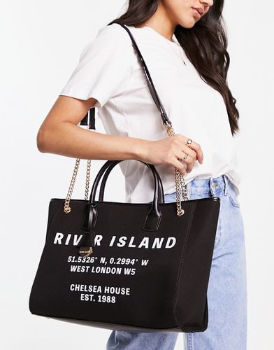 Borsa shopper in tela nera con logo - River Island - Modalova