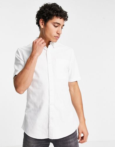 Camicia bianca a maniche corte e 1 tasca - River Island - Modalova
