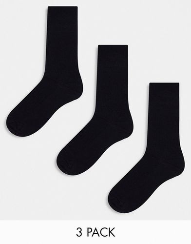 Confezione di 3 paia di calzini neri alla caviglia - River Island - Modalova