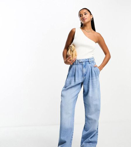 Dad jeans a fondo ampio sartoriali lavaggio azzurro - River Island Petite - Modalova