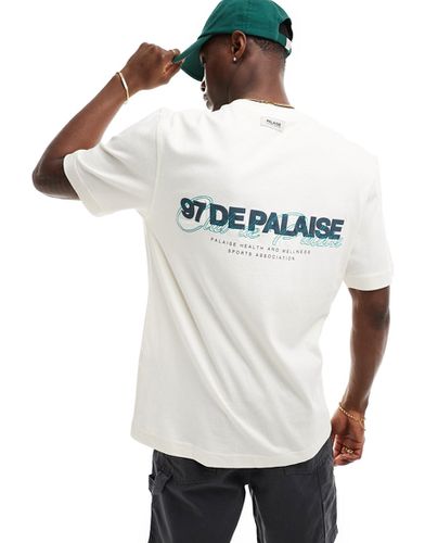 T-shirt écru con stampa "Palaise" sul retro - River Island - Modalova