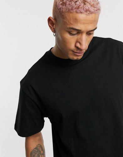 T-shirt oversize nera - Weekday - Modalova